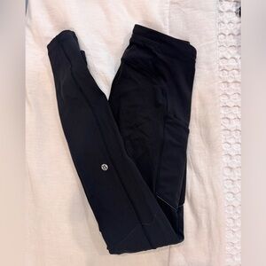 Lululemon Fast and Free leggings with pockets 
Size 2
Color is black